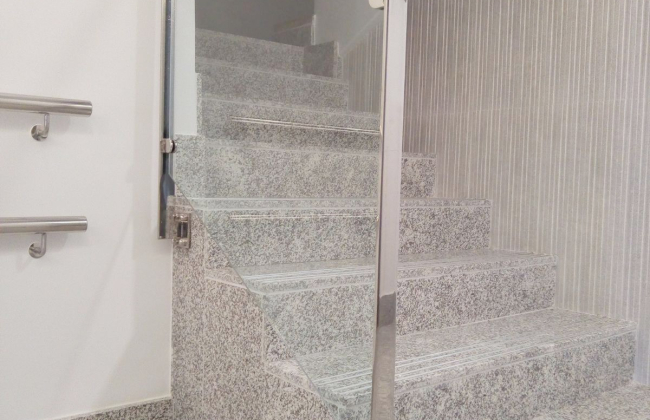 Custom fabrication and installation of handrail and glass doors